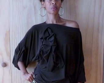 Brown Jersey ity top with beautiful wide detail sleeve/off the shoulder neckline and shorter front