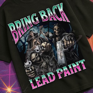 May include: Black t-shirt with the text "BRING BACK LEAD PAINT" in a pink and green gradient font. The graphic features skeletal figures holding guns. The shirt is part of the "Mildly Perturbed" collection.