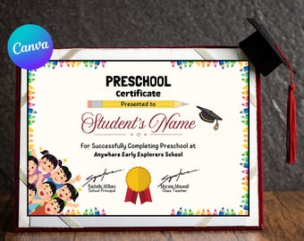 May include: A framed preschool certificate with a graduation cap. The certificate features the text "Preschool Certificate" and space for a student's name. It includes illustrations of a pencil and a graduation cap, with colorful borders.