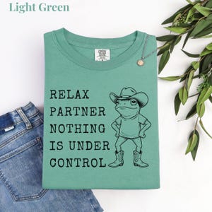 Relax Partner Nothing Is Under Control Shirt, Funny Frog Shirt, Cowboy Frog T Shirt, Funny Frog Unhinged Shirt, Funny Frog Meme Tshirt Light Green