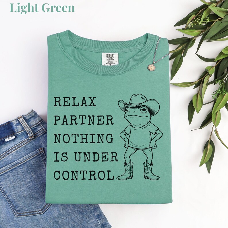 Relax Partner Nothing Is Under Control Shirt, Funny Frog Shirt, Cowboy Frog T Shirt, Funny Frog Unhinged Shirt, Funny Frog Meme Tshirt Light Green