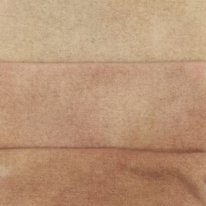 May include: Three fabric swatches in different shades of brown. The top swatch is a light beige, the middle swatch is a medium brown, and the bottom swatch is a dark brown.