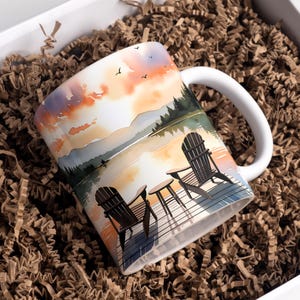 May include: A set of three ceramic mugs with a speckled, matte finish. The mugs are in shades of cream, light gray, and dark gray. Each mug has a simple, modern design and a rounded handle. Perfect for coffee or tea.