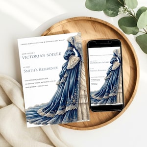 May include: A Victorian Soiree invitation with a blue and white gown illustration. The invitation includes event details: date, time, and location. A smartphone displays the same invitation. The invitation is on a wooden tray.