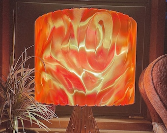 MCM or Mid Century-style lampshade.  Drum-style in Orange, Red and Yellow tones.   Perfect for your Tiki bar, lounge or living room!