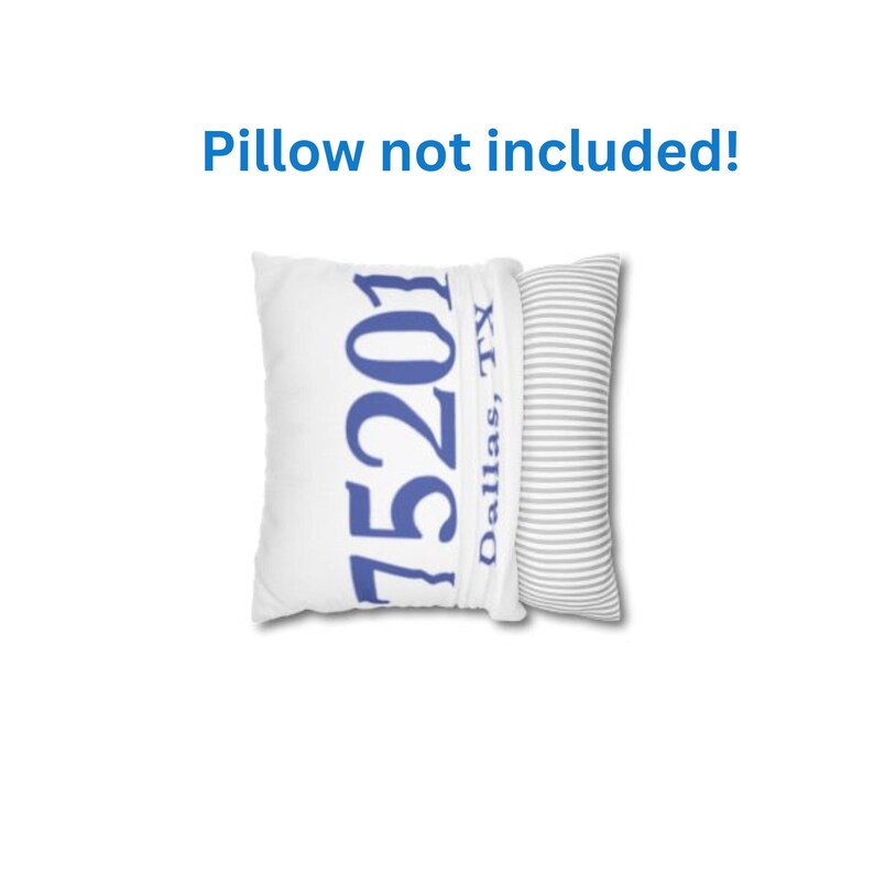 May include: White pillow with the blue text "75201 Dallas, TX". A second pillow with grey and white stripes is next to it. The text "Pillow not included!" is above the pillows.