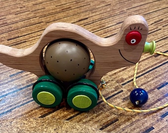 Caracol de madera hecho a mano para tirar – Juguete rústico de arte popular