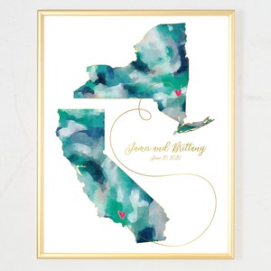 May include: A watercolor map of New York and California with a gold line connecting the two states. The states are painted in shades of blue and green. There are two pink hearts on the map, one in New York and one in California. The text "James and Brittany June 20, 2020" is written in gold script below the map.