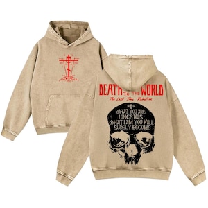 May include: A set of three ceramic mugs with a speckled, matte finish. The mugs are in shades of cream, light gray, and dark gray. Each mug has a simple, minimalist design, perfect for coffee or tea.