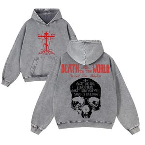 May include: A set of three ceramic mugs with a speckled, matte finish. The mugs are in shades of cream, light gray, and dark gray. Each mug has a simple, minimalist design, perfect for coffee or tea.