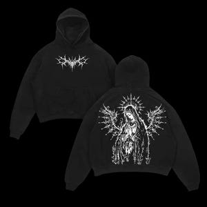 May include: Black hoodie with a front pocket and a hood. The front features a white, stylized graphic. The back of the hoodie displays a detailed white illustration of a religious figure with a halo and wings. The hoodie is made of a soft material.