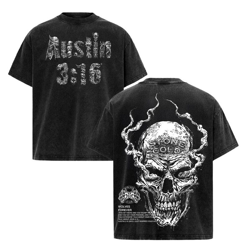 May include: Black t-shirt with white graphic text and skull design. The front features "Austin 3:16" in a skeleton-style font. The back displays a detailed skull with "Stone Cold" and "Wolves Forever" text.