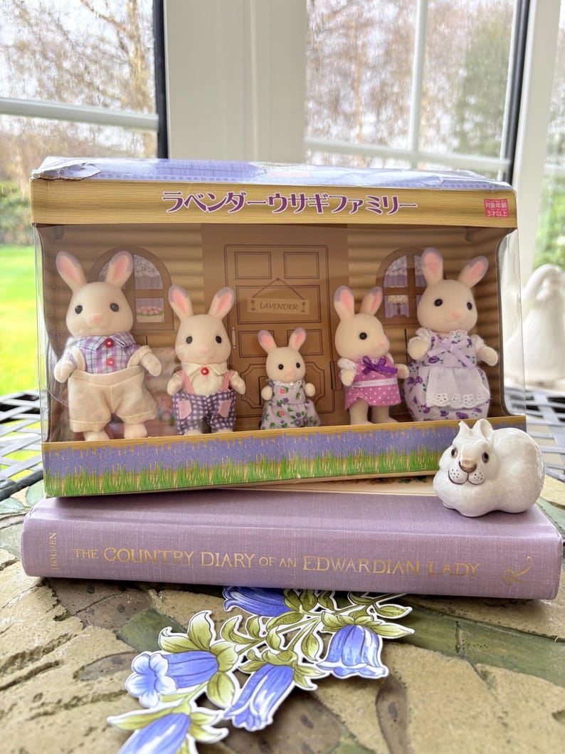 May include: A set of three ceramic mugs with a speckled, matte finish. The mugs are in shades of cream, light gray, and dark gray. Each mug has a simple, minimalist design and a rounded handle.