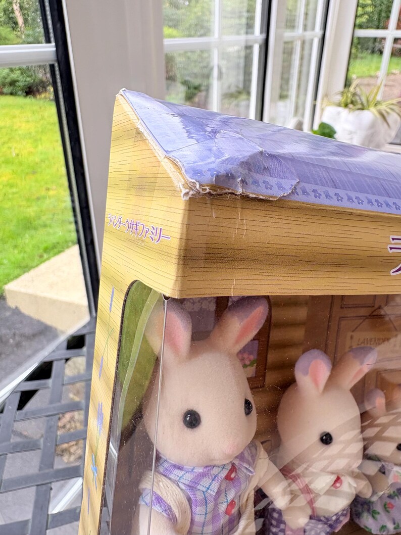 May include: A set of three ceramic mugs with a speckled, matte finish. Each mug features a different color: light blue, cream, and gray. The mugs have a simple, modern design with a rounded shape and a comfortable handle.