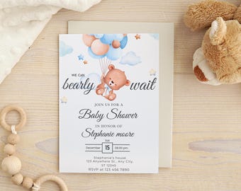 May include: Baby shower invitation with a teddy bear illustration holding balloons. The text reads "We can bearly wait" and includes event details. The design features blue, peach, and white colours. The invitation is for Stephanie Moore's baby shower.