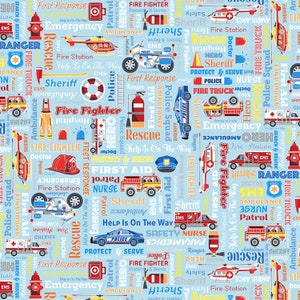 May include: A blue and white fabric with a repeating pattern of various emergency vehicles, including police cars, fire trucks, ambulances, and helicopters. The pattern also includes words related to emergency services, such as "first response", "fire fighter", "sheriff", "rescue", and "emergency".