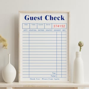 May include: A framed print featuring a blue and white guest check design. The words "Guest Check" are at the top, with sections for date, table, guests, and server. The server number is 374152. Below are lines for itemizing orders. The bottom reads "Thank You - Please Come Again."