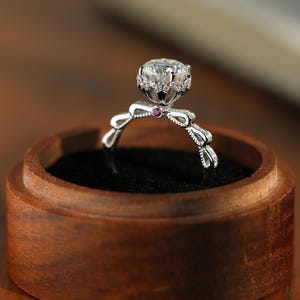 Bow Moissanite Engagement Ring,2CT Round 9K White Gold Ribbon Ring with Ruby Accent,Unique Romantic Floral Cluster Ring,Delicate Bridal Ring