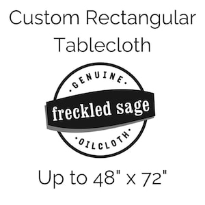 May include: Custom rectangular tablecloth with the text "Custom Rectangular Tablecloth". The image includes a circular logo with the words "GENUINE" and "freckled sage OILCLOTH". The tablecloth is available up to 48" x 72".