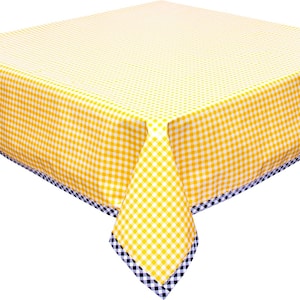 May include: A square tablecloth featuring a bright yellow and white gingham check pattern. The edges of the fabric are finished with a contrasting border consisting of a smaller black and white checkered pattern that frames the entire piece.