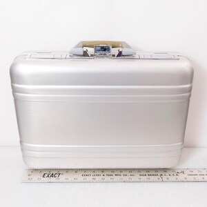 Zero Halliburton Attache - Porte-documents en aluminium pour ordinateur portable avec cadenas à combinaison, argent