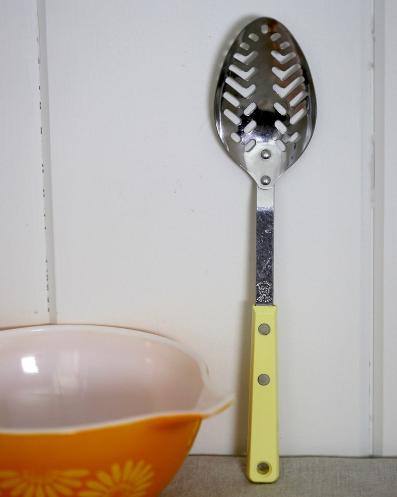 Ecko stainless steel made in the USA Retro Straining Spoon from the 1960/'s with yellow handle
