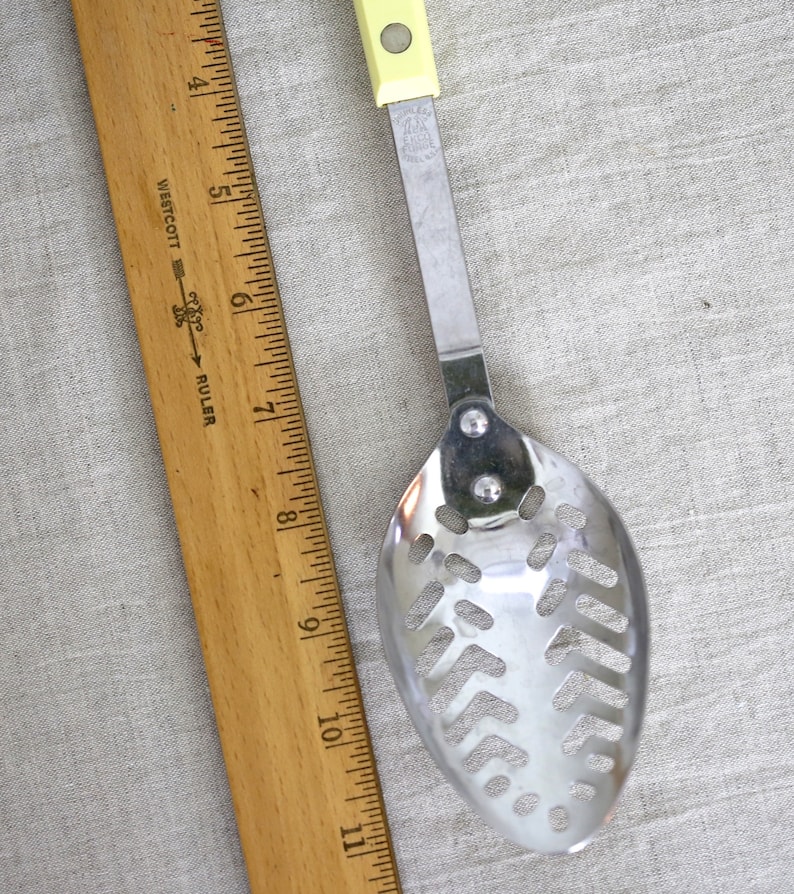 Ecko stainless steel made in the USA Retro Straining Spoon from the 1960/'s with yellow handle