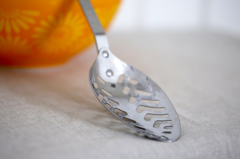 Ecko stainless steel made in the USA Retro Straining Spoon from the 1960/'s with yellow handle