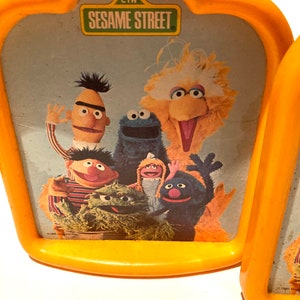 Vintage 1980’s Yellow Plastic Sesame Street Bookends Featuring Big Bird, Bert and Ernie, Cookie Monster, Oscar the Grouch and Elmo!