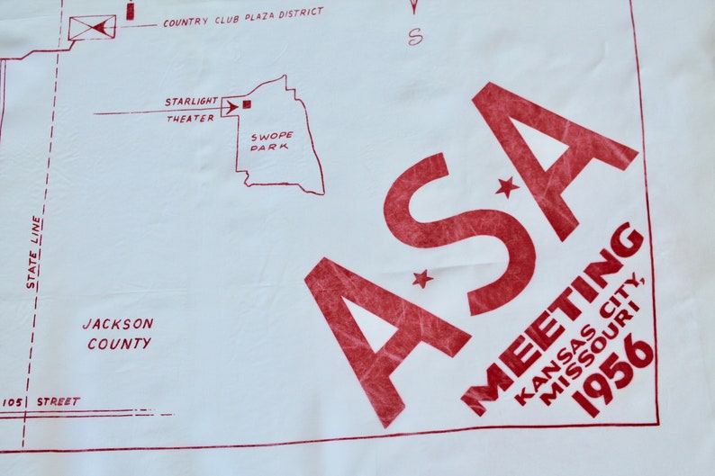 May include: A red and white map with the text "ASA Meeting Kansas City, Missouri 1956". The map shows the location of Starlight Theater and Swope Park in Kansas City, Missouri.