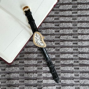 Surrealist Melting Gold Watch: Dali Inspired Design, Black Leather Strap