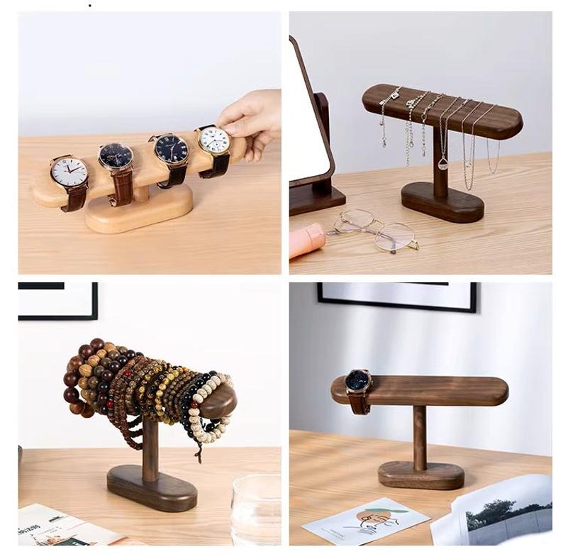 May include: Wooden watch and jewelry display stands. The stands are in various shapes and sizes, showcasing watches, necklaces, and bracelets. The wood has a natural finish, and the stands are arranged on a light-colored surface.