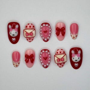 Uñas postizas de conejito de San Valentín, uñas con lazo rojo y rosa, uñas con letras de amor, set de uñas de corazón kawaii, uñas postizas hechas a mano