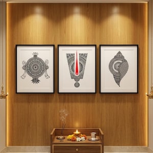 May include: Three framed wall art prints featuring intricate black and white mandala-style illustrations. The left print shows a circular emblem, the centre displays a U-shaped tilak with a red accent, and the right depicts a detailed conch shell.
