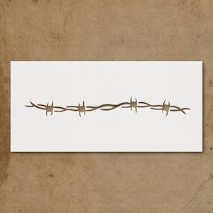 May include: A horizontal stencil featuring a brown barbed wire design on a white rectangular background. The barbed wire has sharp, pointed barbs along a wavy line. The stencil is likely used for decorative purposes or crafts.