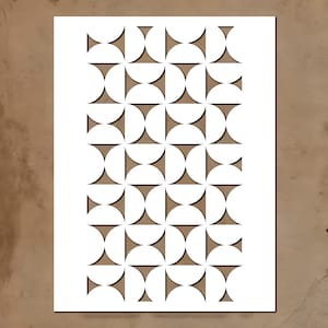 May include: A rectangular white stencil featuring a repeating geometric pattern of cut-out semi-circles arranged in vertical columns. The design creates a series of hourglass-like shapes between the white curved segments, revealing the surface beneath.
