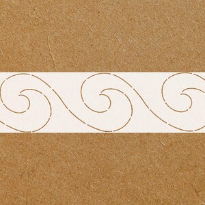 May include: A rectangular stencil featuring a repeating wave pattern. The waves are depicted in a flowing, stylized design with rounded swirls. The stencil is white, set against a textured brown background.