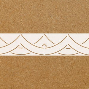 May include: A rectangular stencil featuring a repeating wave-like pattern. The design consists of interconnected curved lines and triangular shapes, all in a light brown color, set against a textured brown background.