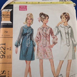 May include: Vintage sewing pattern for a dress or pantdress. The pattern is for misses' and junior sizes. The pattern is from McCall's and is size 8, bust 31 1/2 inches. The pattern is for a dress with a collar and long sleeves. The pattern is from the 1960s.
