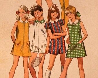 Simplicity 9902 girls' dress and short pantdress/playsuit pattern size 14, chest 32"
