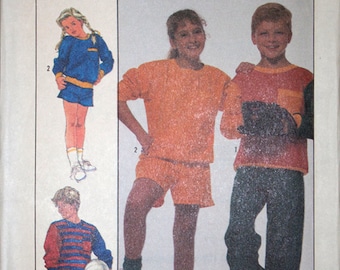 Simplicity 8964, Boys' and girls' knit pants, shorts, and top pattern, size 8-10, chest 27-28"