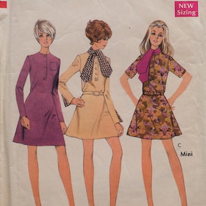 May include: A vintage sewing pattern for a mini dress with three different styles. The pattern is for size 12 and bust 34. The pattern is called "Style 2580".