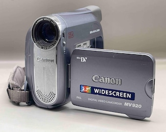 Câmera de vídeo Canon MV920 MiniDV vintage – Zoom óptico de 25x, PAL (Para peças)
