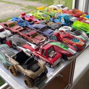 Lot of 27 Hot Wheels Cars – Mixed Styles, No Repeats, Good Condition – Vintage & Modern Die-Cast