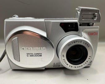 Vintage Olympus C-300 zoom digitale camera, retro camera begin jaren 2000, Olympus Collector Item, Y2K-technologie, vintage digitale camera