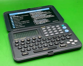 Organizador pessoal eletrônico vintage — 32 KB de memória — Funcionando — PDA de bolso dos anos 90/2000