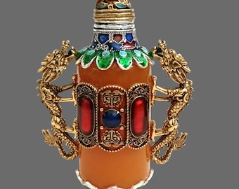 Amberkleurige snuiffles met drakenmotieven: verzamelobject prachtige emailkunst en cultureel erfgoed