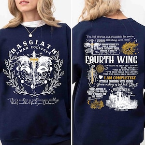 May include: Navy blue sweatshirt with white and gold graphic designs. The front features a sword, wings, and text that reads "BASGIATH WAR COLLEGE." The back displays "FOURTH WING" and additional text. A stylish and comfortable apparel item.