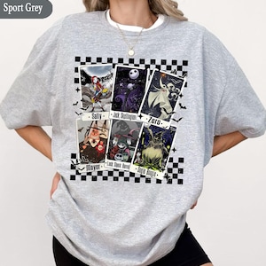 May include: A set of three ceramic mugs with a speckled, matte finish. The mugs are in shades of cream, light gray, and dark gray. Each mug has a simple, minimalist design, perfect for coffee or tea.