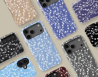 May include: A collection of phone cases in various colors, including tan, blue, black, gray, and burgundy. Each case features a repeating pattern of white stars connected by wavy lines. The cases are designed to fit different phone models.